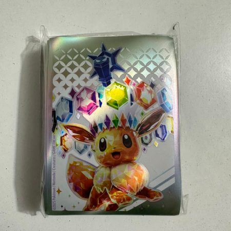 Protectores Oficial Eevee Prismatic Evolutions